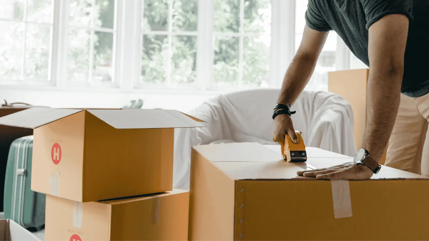 Packers & Movers carefully packing household goods for safe transport